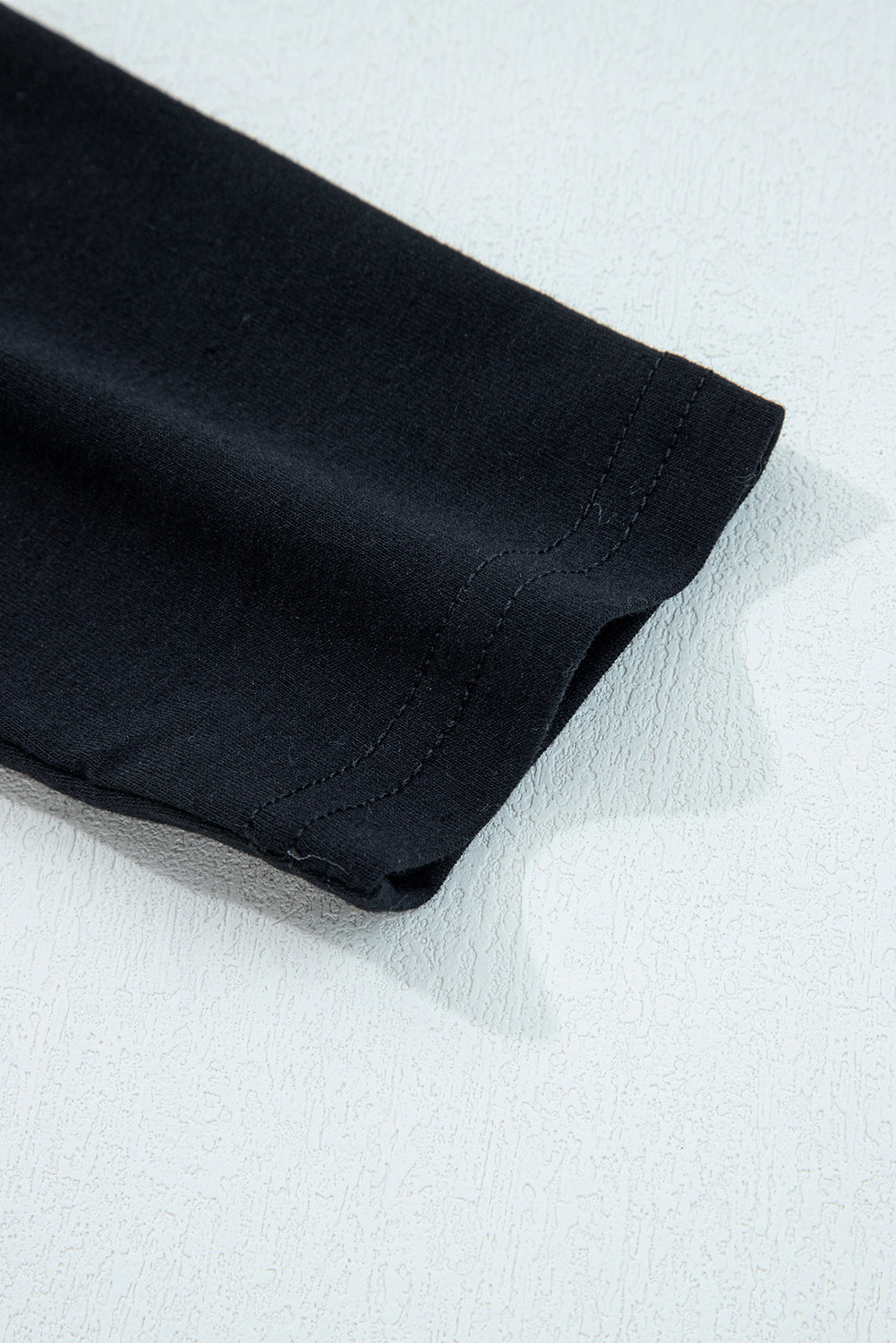 Black Asymmetric Seam Detail Solid Color Long Sleeve Top